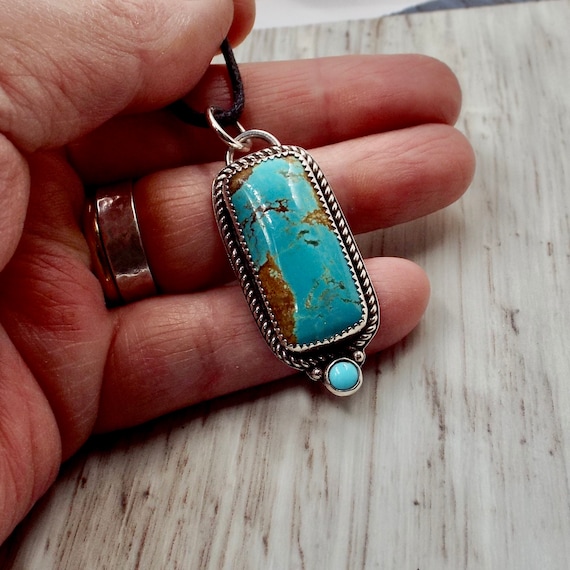 Sterling Silver Reconstituted Turquoise Ring with Rope Design Frame Sterling Silver Reconstituted Turquoise Ring with Rope Design Frame