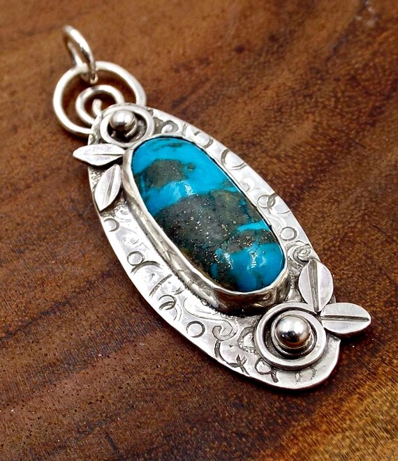 Turquoise Oval Pendant With Flower Accents, Sterling Silver Necklace