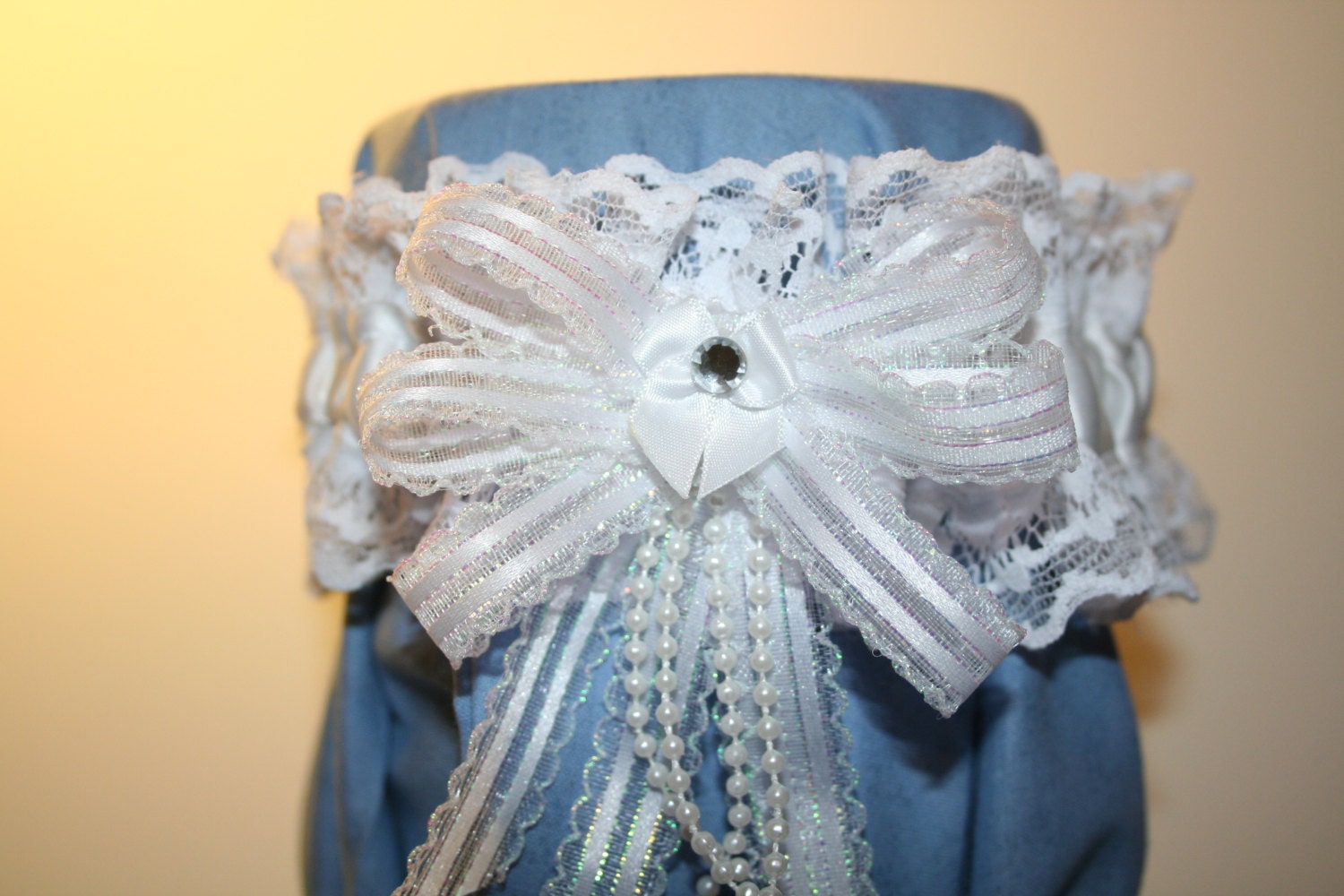 White garter set with double lace ruffle and sparkle ribbon bow, pearls, crystals