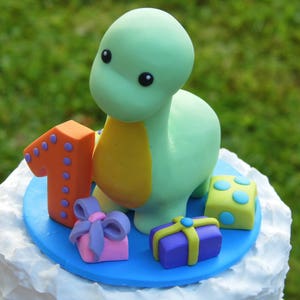 Custom Dinosaur birthday cake topper, Dinosaur birthday party theme, Personalized cake topper, Dinosaur figurine, Dinosaur clay cake decor