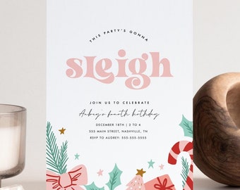 May include: A white invitation card with the text "This party's gonna sleigh" in pink letters. The card has a festive Christmas theme with illustrations of presents, candy canes, holly, and stars. The text "Join us to celebrate Aubrey's fourth birthday" is written in cursive.