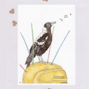 May include: Watercolour illustration of a magpie perched on a yellow helmet with colourful antennae. The bird is singing, with musical notes above its head. The helmet has the word "STAGNER" on it.