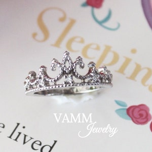 925 sterling silver princess Crown Ring white gold plated with diamonds.