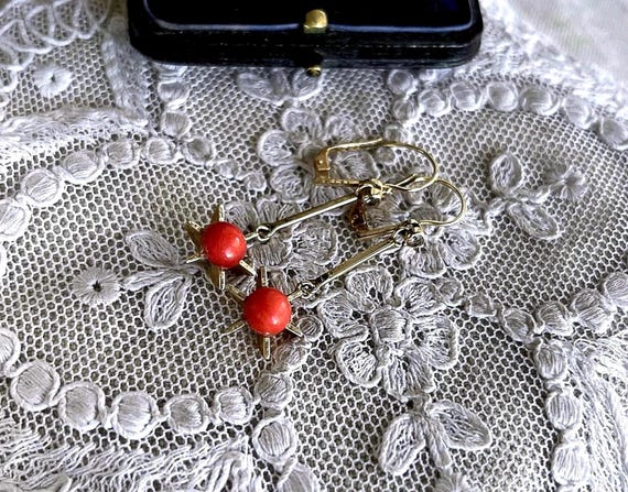 Vintage 12K Yellow Gold bright Coral Faceted Spinel accented beautiful Starburst lever back Drop Earrings