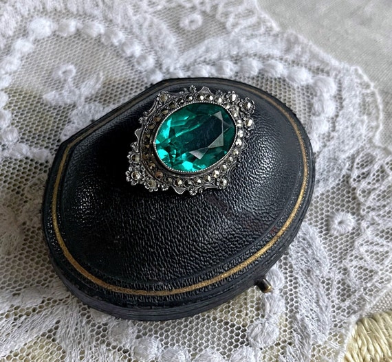 Brilliant vintage Art Deco Era Sterling Silver faceted Emerald Green Paste Stone Marcasite accented hallmarked Statement Brooch