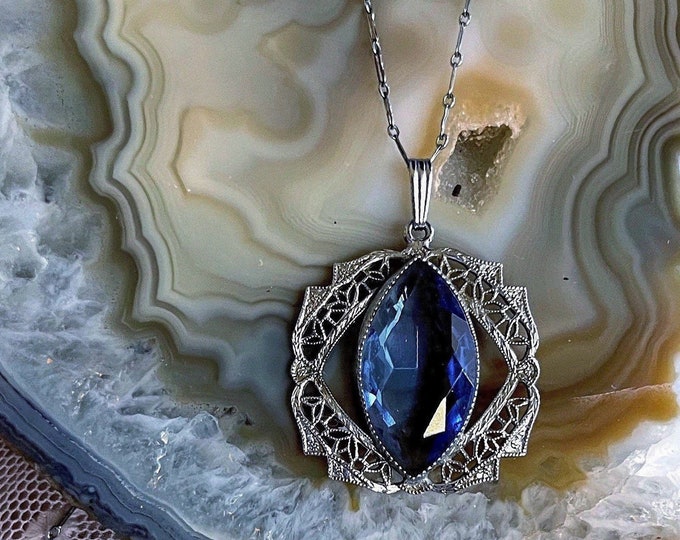 Pristine antique Edwardian 1910s-20s Rhodium Plated Filigree faceted Sapphire Blue Paste Stone accented elegant Pendant Necklace