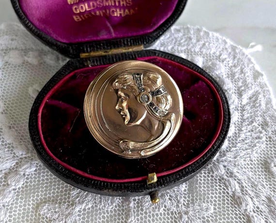 Antique Victorian Gold Filled Pinchbeck faceted Paste Stone accented Silhouette figurative Locket Brooch