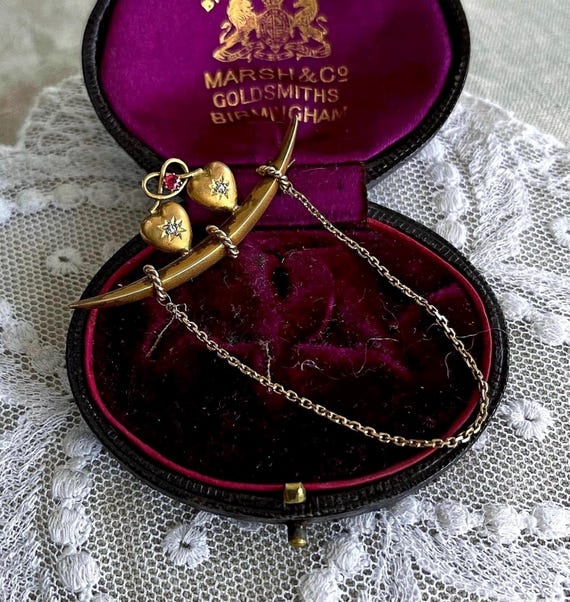 Fine antique Newcastle Victorian Romantic Era 9k Gold genuine Ruby and Diamond accented Dual Hearts hallmarked C Clasp dangle Brooch