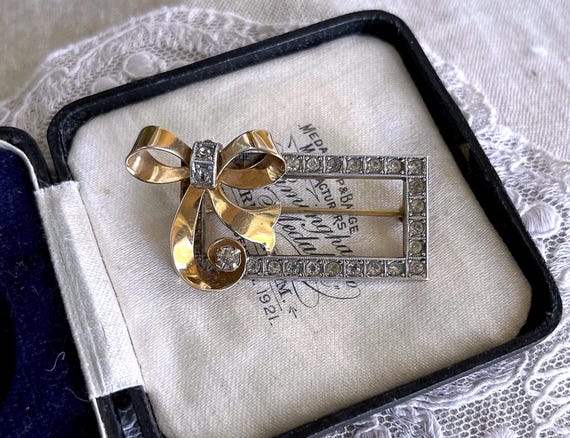 Smart vintage 1940s Art Deco Sterling Silver Gold Filled brilliant faceted Paste Stone accented sophisticated Bow Motif Statement Brooch