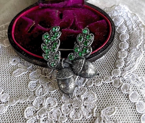 Antique Victorian Era Sterling Silver faceted Emerald Green Paste Stone Marcasite accented Acorn Brooch