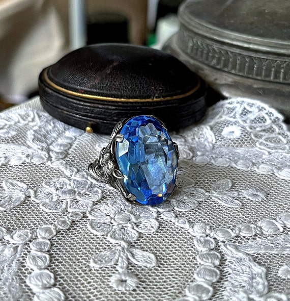 Bold antique Arts and Crafts Sterling brilliant faceted Blue Paste Stone accented unique stamped adjustable Statement Ring