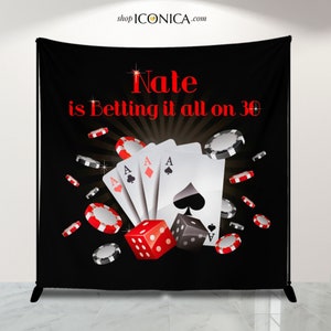 May include: Black backdrop with the text "Nate is Betting it all on 30". The design features playing cards, dice, and poker chips. The website shop ICONICA.com is in the top left corner.