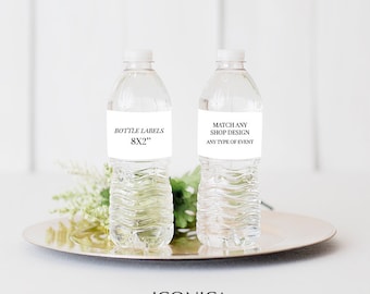 May include: Two clear plastic water bottles with white labels. The label on the left bottle says "Bottle Labels 8x2". The label on the right bottle says "Match Any Shop Design Any Type of Event".