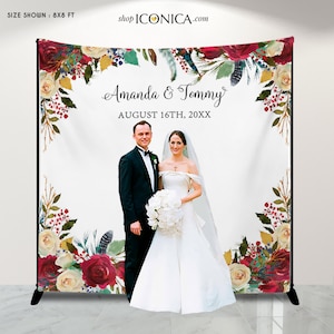 Boho Chic Wedding Backdrop: Burgundy Floral & Feather Design