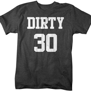 May include: Dark gray t-shirt with white text that reads "DIRTY 30".