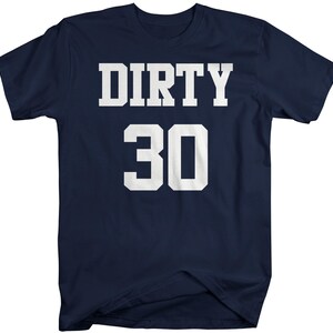 May include: A navy blue t-shirt with white text that reads "DIRTY 30".