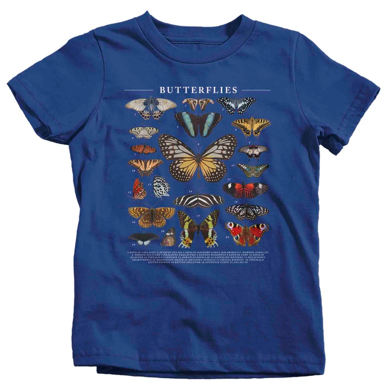 May include: A royal blue t-shirt with a graphic of butterflies and the word "Butterflies" printed on the front. The butterflies are numbered and labeled with their scientific names.