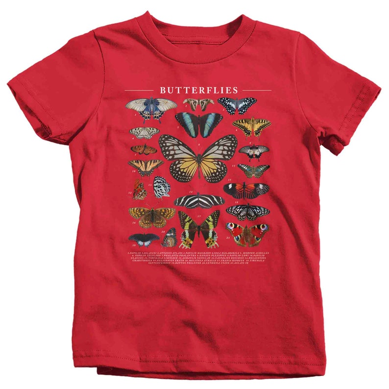 May include: Red t-shirt with a graphic of various butterflies and the word "Butterflies" printed on the front.