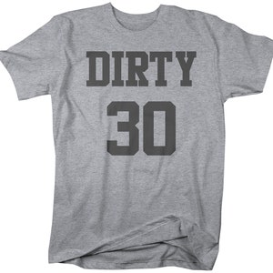 May include: Gray t-shirt with the text "DIRTY 30" in black.