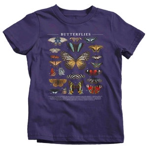 May include: Purple t-shirt with a graphic of various butterflies and the text "Butterflies".