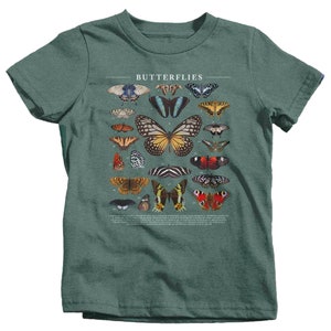 May include: A green t-shirt with a graphic of butterflies. The butterflies are numbered and labeled with their scientific names. The text "Butterflies" is printed at the top of the graphic.
