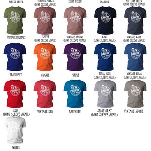 May include: A selection of t-shirts in various colours, each with a circular graphic that reads "Cheers & Beers". The shirts are available in a range of sizes and colours, including Army, Black, and Red.