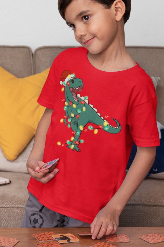 Kids Christmas Shirt T-Rex XMas Lights T Shirt Tyrannosaurus Tee Tree Lights Santa Hat Dinosaur Holiday Funny Graphic Tshirt Unisex Youth