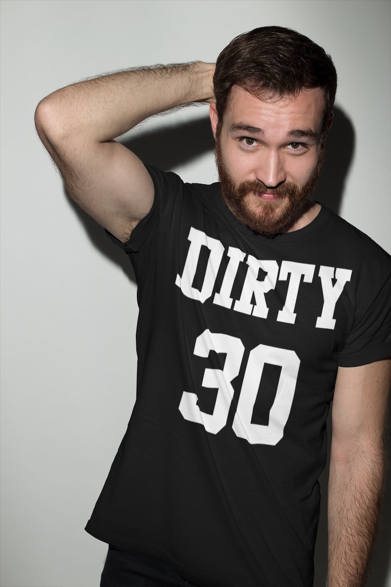 May include: A black t-shirt with white text that reads "DIRTY 30".