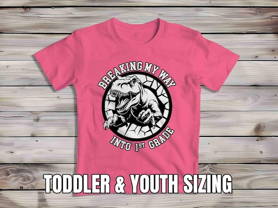 Kids 1st Grade Shirt Dinosaur TShirt T-Rex Breaking Into T-Shirt TRex Dino First Grader Gift T Shirt Cute Girl's Boy's Children's Youth