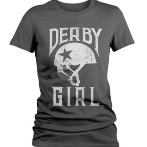 May include: A dark gray t-shirt with a white graphic of a roller derby helmet with a star and the text "DERBY GIRL".