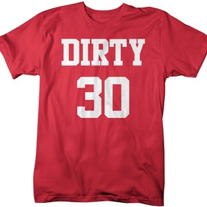 May include: Red t-shirt with white text that says "Dirty 30".