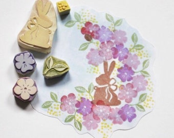 Hase im Blumenbeet Ostern Stempel handgeschnitzt