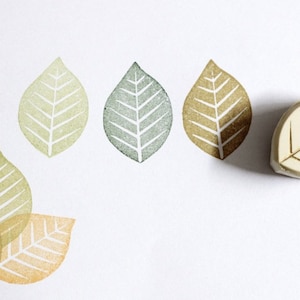 Sheet, hand carved rubber stamp