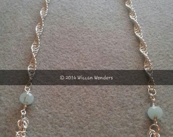 sterling silver necklace featuring facetted aquamarine beads