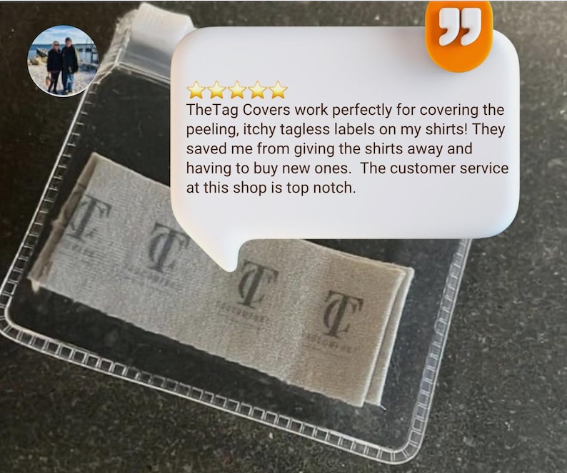 May include: A clear plastic case containing two gray fabric tag covers with the text "T" and "Tagless" printed on them. The image also includes a customer review in a speech bubble.