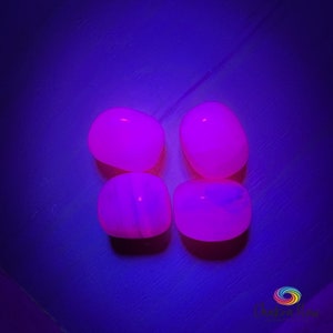 Pink Mangano Calcite - Tumbled - Black light glow