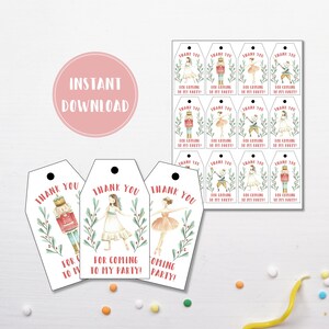 May include: Printable thank you tags featuring a watercolor illustration of a ballerina and a nutcracker. The tags are white with red text that says "Thank You for coming to my party!"