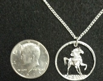 Stallion coin jewelry pendant cut from a Kennedy half dollar