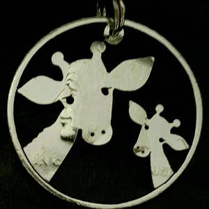 Two Giraffe pendant cut from a half dollar coin jewelry, Hand Cut Coin