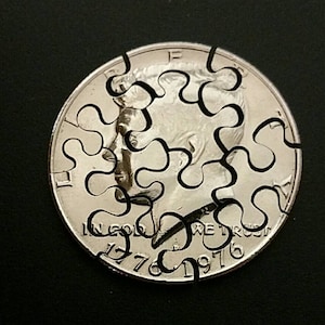 Puzzle cut from a Kennedy half dollar, coin art, Coin Puzzle, Hand Cut Coin