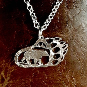 Bear in a Pawprint cut from a Coin, Hand cut coin, Tribal Jewelry