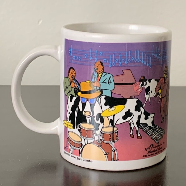 Moosical Cows mug, partying cows by Sherwood Brands. 2003 Mootown Rythym and Blues on one side, Jammin' Cow Jazz Combo on the other