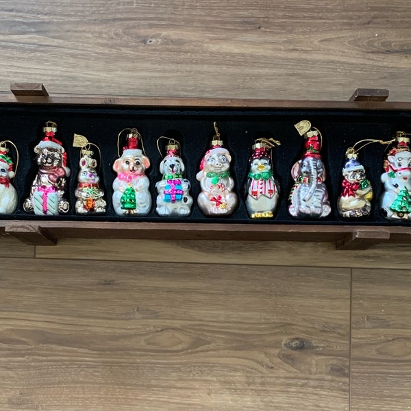 Thomas Pacconi Classics 12 piece 2004 ornament set in wooden crate. Cute glass animal ornaments in Christmas attire.