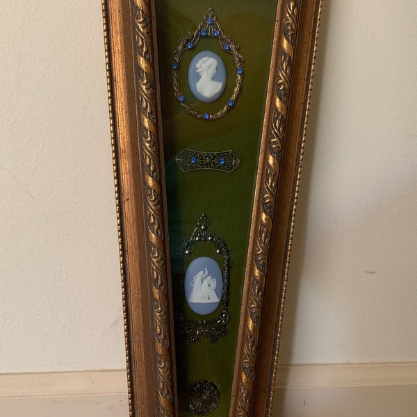 Vintage Wedgwood style trapezoid frame shadow box wall decor, blue and white cameos, blue rhinestones, metal accents.