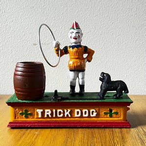 Vintage 1970s Cast Iron Trick Dog Mechanical Coin Bank – Reproduction Leaping Dog Bank