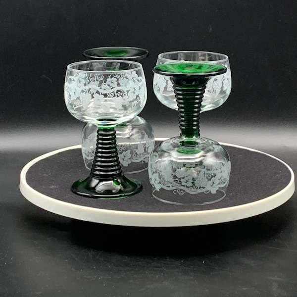 Luminarc green beehive stem wine glasses. Deep green stems, clear bowls etched with grapes and leaves.