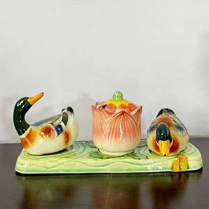 Vintage ceramic figural duck and tulip condiment set, salt, pepper, mustard pot with lid, spoon, and undertray