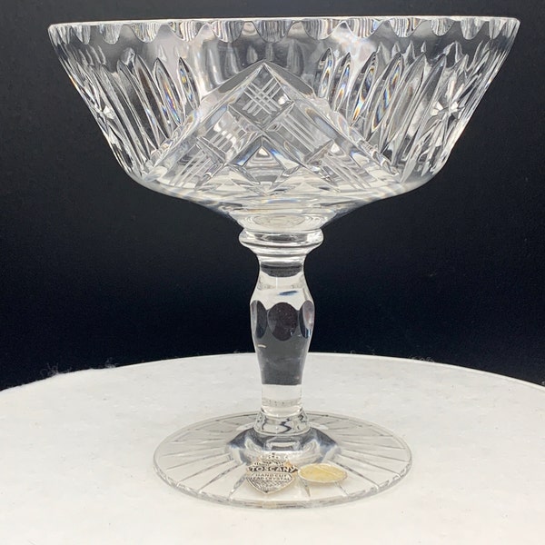 Toscany hand cut crystal compote with original labels, made in Western Germany. Footed crystal dish with interesting lines and stars.