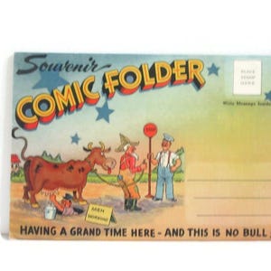 May include: A rectangular souvenir comic folder postcard featuring a cartoon of a brown cow, a farmer, and a worker with a stop sign. The text reads Souvenir Comic Folder, Men Working, and Having a grand time here - and this is no bull!