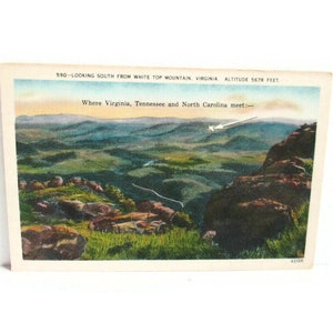 May include: Vintage postcard featuring a scenic view from White Top Mountain in Virginia. The image shows rolling green hills, rocky terrain, and the text "Where Virginia, Tennessee and North Carolina meet." The altitude is noted as 5678 feet.